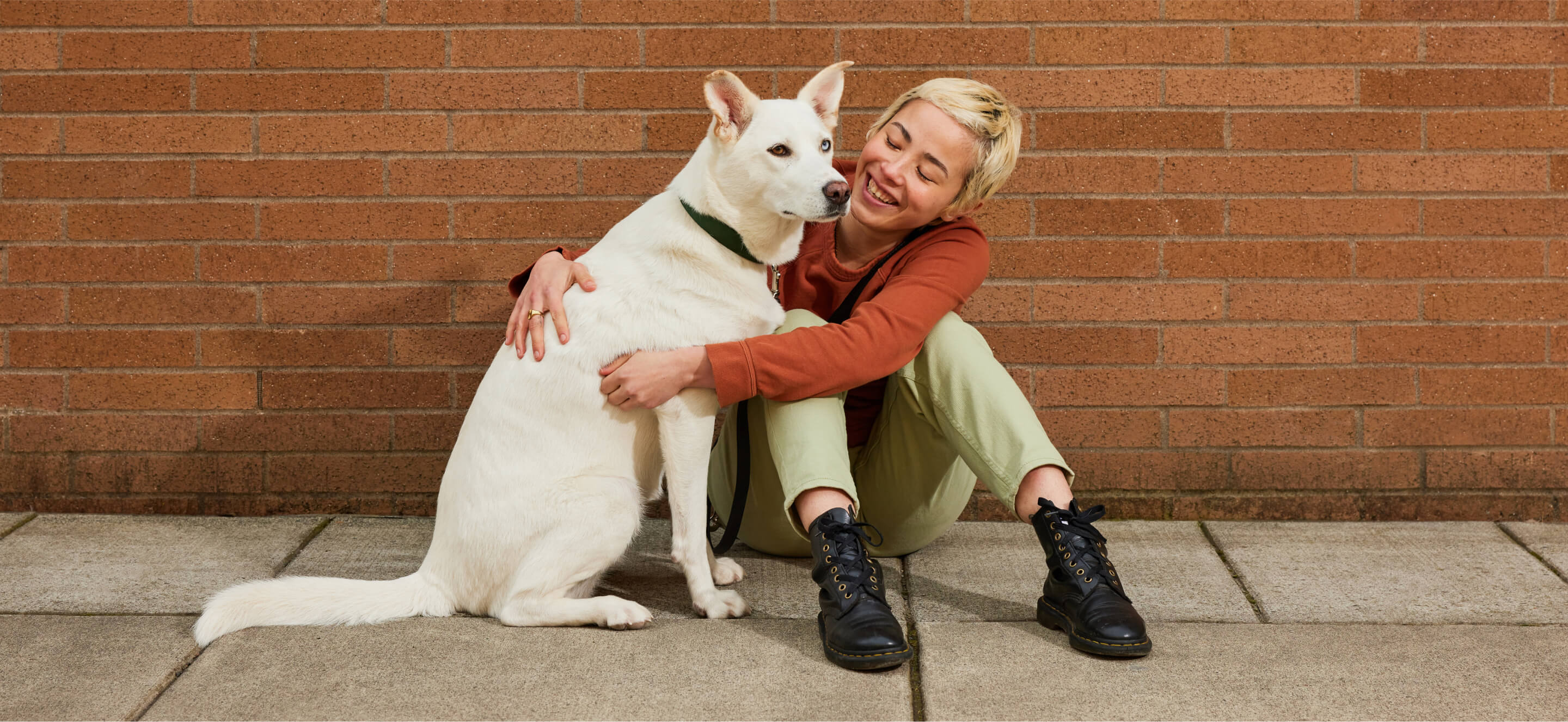 Photo of pet parent with pet.